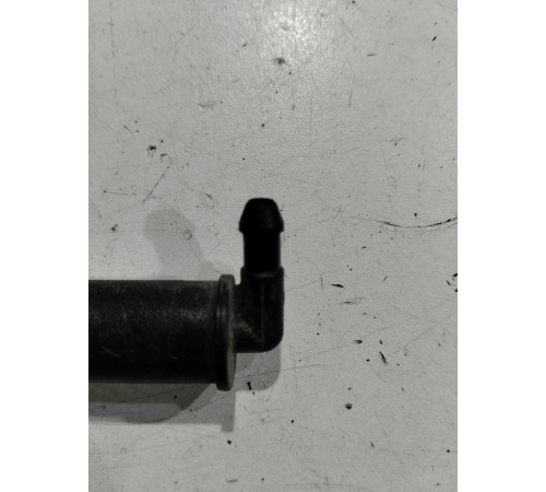 Форсунка омывателя фары правая