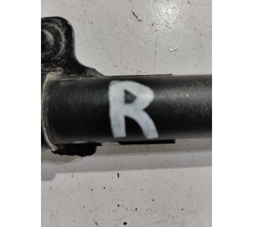 Форсунка омывателя фары правая