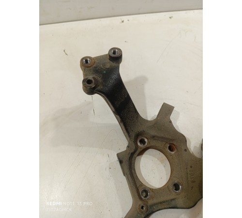 Кулак поворотный задний левый