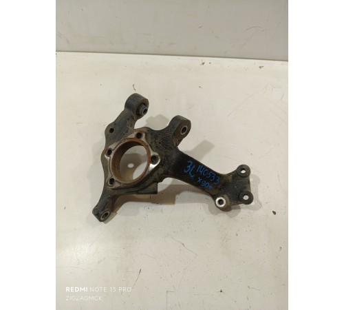 Кулак поворотный задний левый