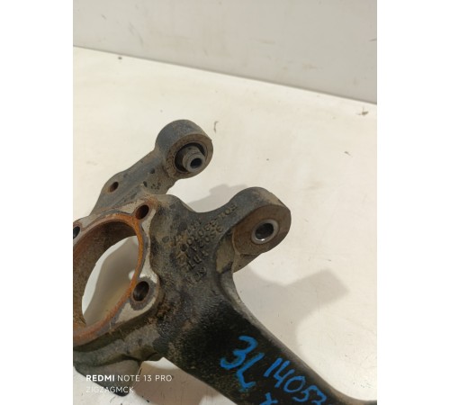 Кулак поворотный задний левый