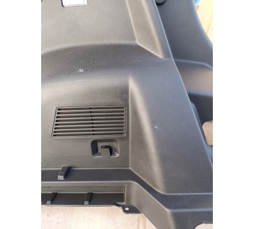 Обшивка багажника левая