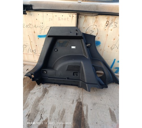 Обшивка багажника левая