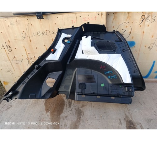 Обшивка багажника левая