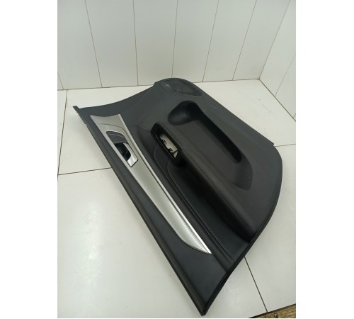 Обшивка двери передняя левая