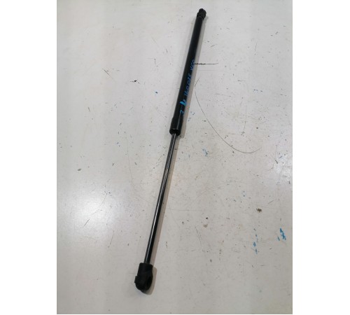 	Амортизатор двери крышки багажника левый