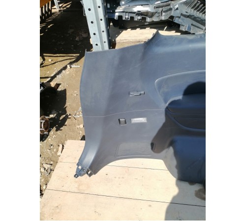 Обшивка багажника левая