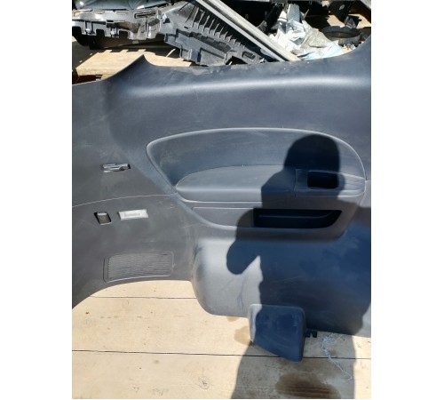 Обшивка багажника левая