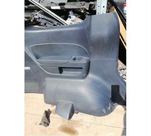 Обшивка багажника левая