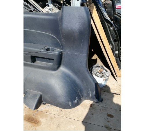 Обшивка багажника левая