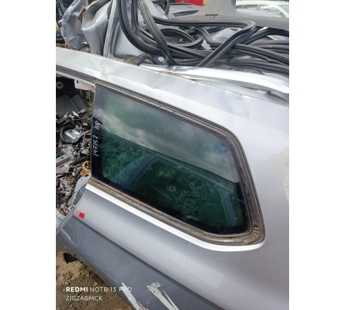Глухое стекло заднее левое