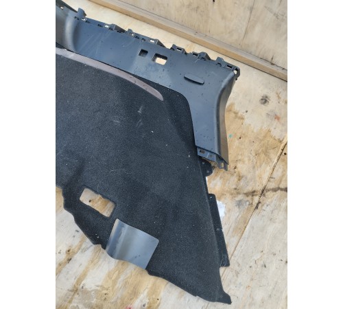 Обшивка багажника левая