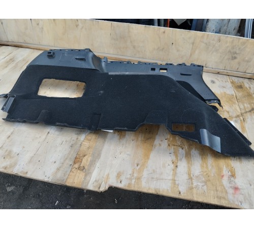 Обшивка багажника левая