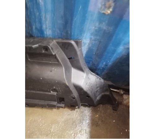 Обшивка багажника левая