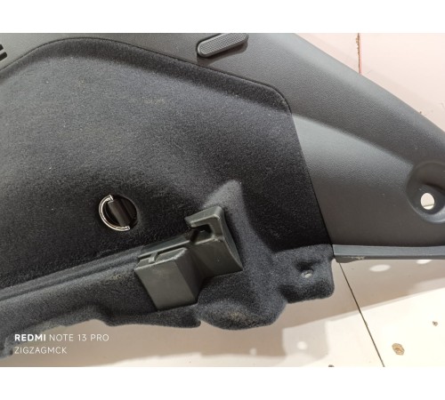 Обшивка багажника левая