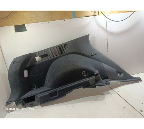 Обшивка багажника левая