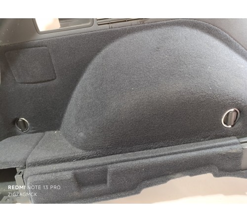 Обшивка багажника левая