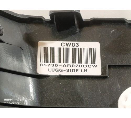 Обшивка багажника левая