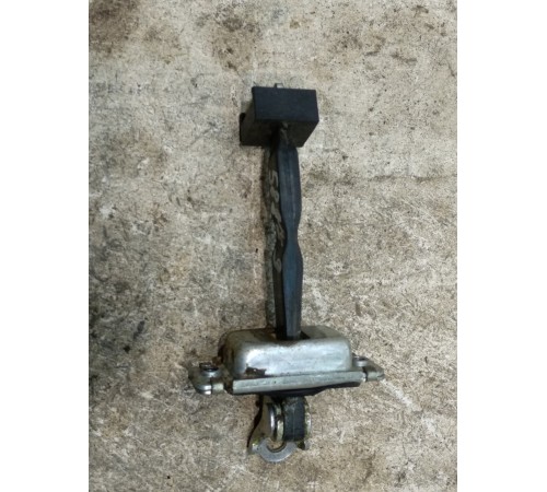 Ограничитель двери задний левый