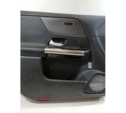 Обшивка двери передняя левая