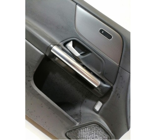 Обшивка двери передняя левая