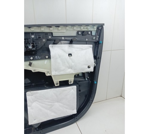 Обшивка двери передняя левая