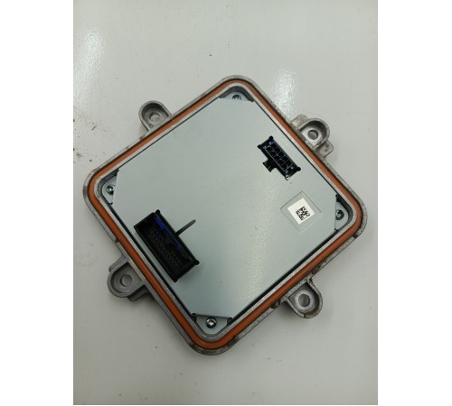 Блок розжига фары левый