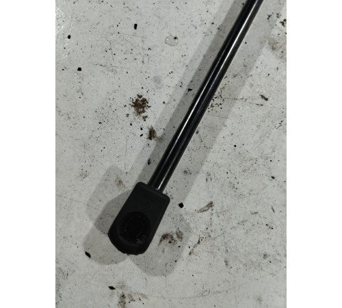 Амортизатор крышки багажника левый