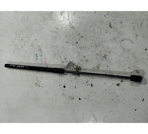 Амортизатор крышки багажника левый