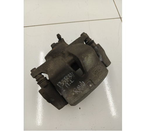 Суппорт тормозной передний левый