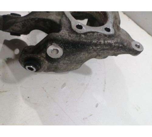 Поворотный кулак,задний левый