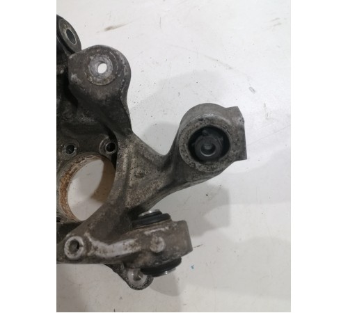 Поворотный кулак,задний левый