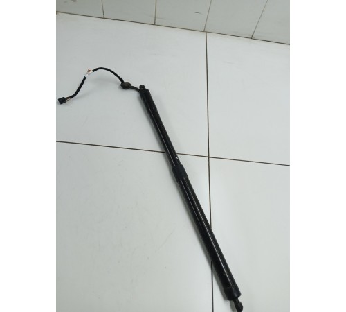 Амортизатор крышки багажника левый