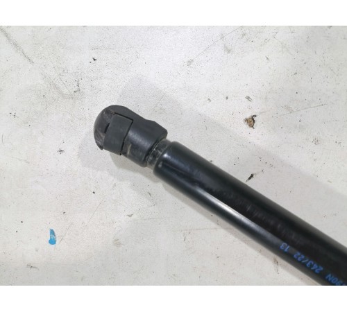 Амортизатор двери крышки багажника левый