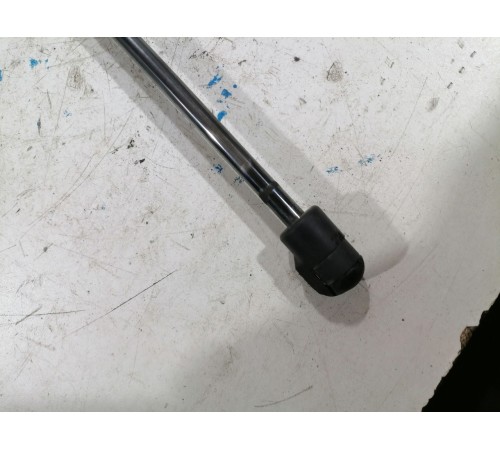 Амортизатор двери крышки багажника левый