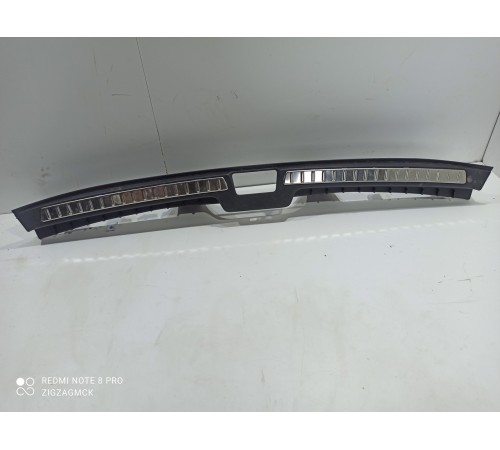 Накладка замка багажника нижняя