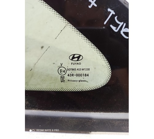 Стекло глухое (заднее левое)