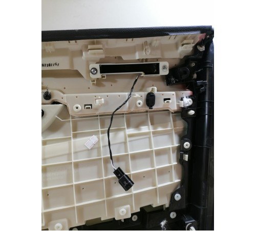 Обшивка двери передняя левая