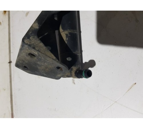 Форсунка омывателя фар перед.