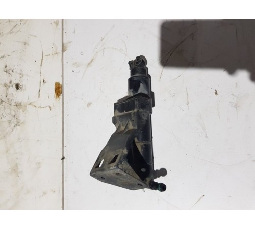 Форсунка омывателя фар перед.