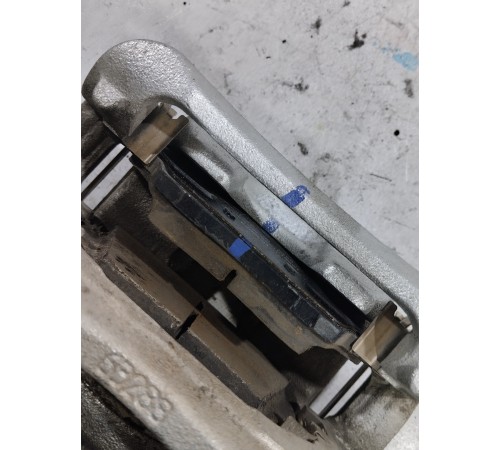 Суппорт тормозной передний левый