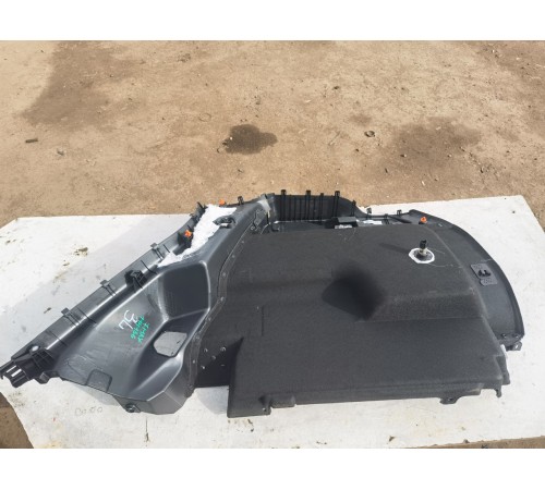 Обшивка багажника левая