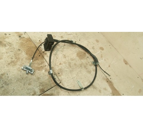 Трос стояночного тормоза салонный