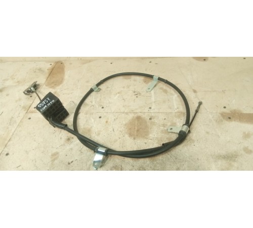 Трос стояночного тормоза салонный