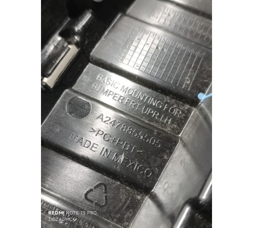 Накладка переднего бампера верхняя левая