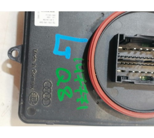 Блок розжига фары левый