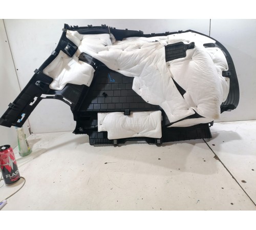 Обшивка багажника левая