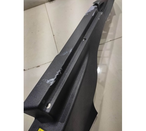 Обшивка багажника (левая)