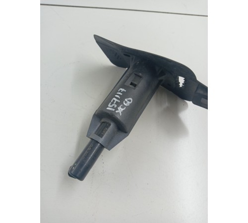 Форсунка омывателя фар левая