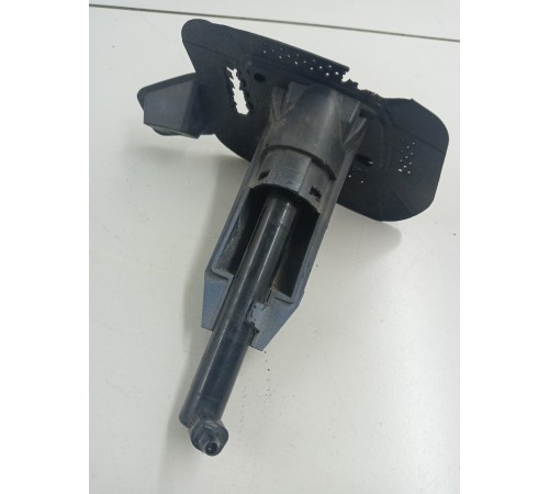 Форсунка омывателя фар левая